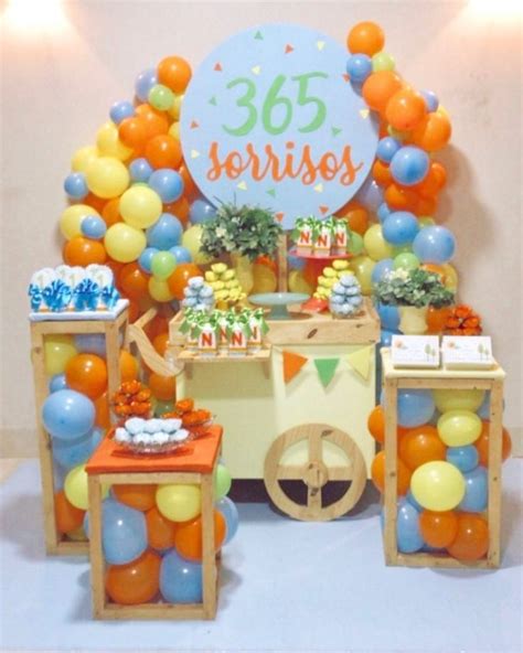 A Birthday Party With Balloons And Decorations