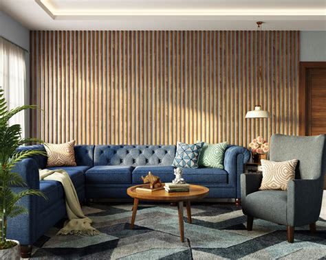 living room wall design  wooden fluted panels  blue sofa livspace