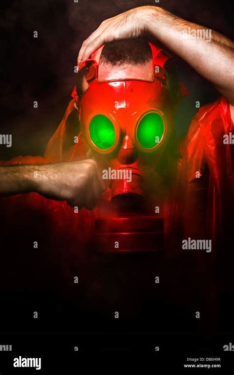 Toxic Horror Concept Man With Red Gas Mask Stock Photo Alamy