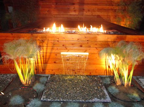 Custom fire pit with Fire Crystals, and water feature within Spa's ...