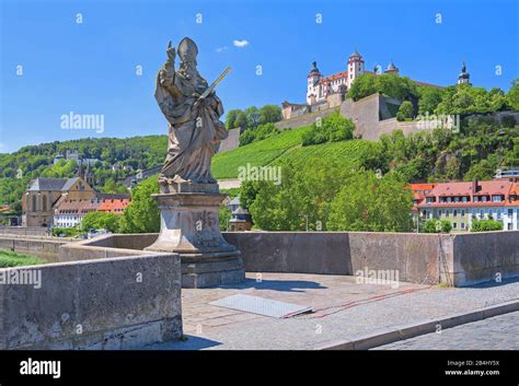 Sculpture Of Saint Kilian On The Old Main Bridge And Fortress