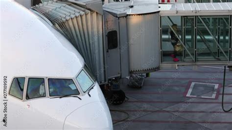 Aircraft With Passage Corridor Tunnel Being Prepared For Departure From An International Airport