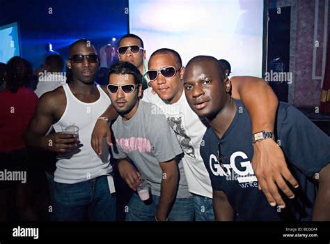 A Group Of Black Males In A Weekender Nightclub In Norfolk Posing