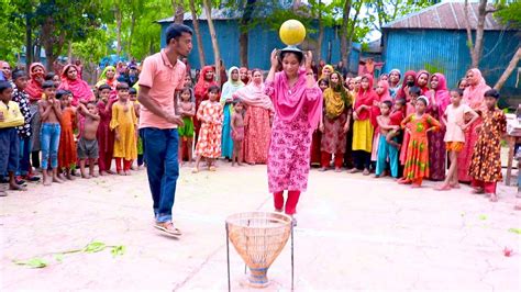 পলোর মধ্যে বল ফেলতে পারলে পুরস্কার গ্রামের সব থেকে মজার খেলার