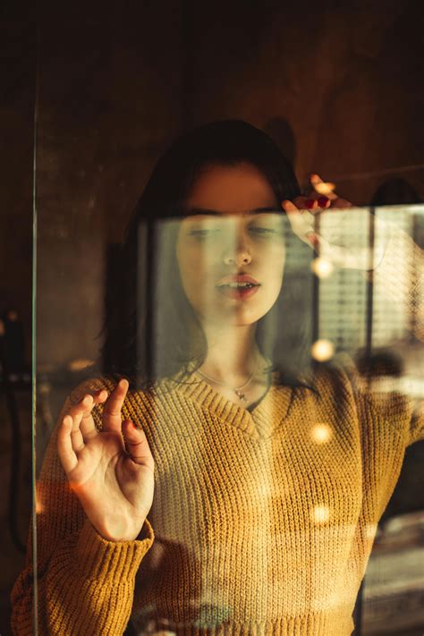 photo  woman leaning  glass  stock photo