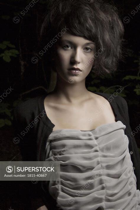 Portrait Of A Brunette Woman SuperStock