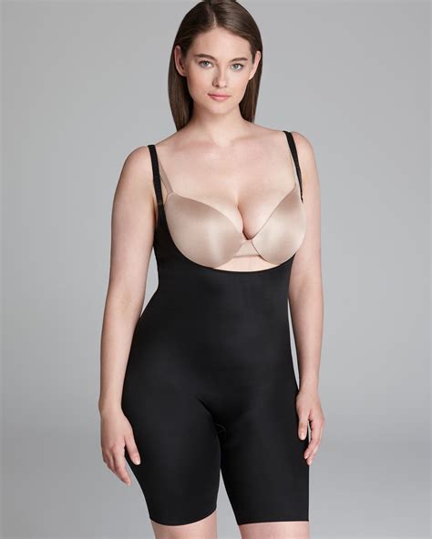 Lyst Spanx Plus Size Bodysuit Slimplicity Open Bust Midthigh In Black