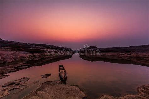 Wooden Boat At Grand Canyon Of Thailand In The Sunset Stock Photo