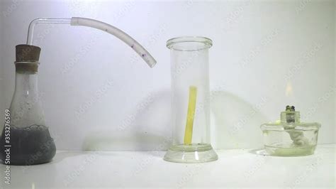 A Cylinder Glass Is Filled Wih Oygen And Burning Sulphur Lowered Into