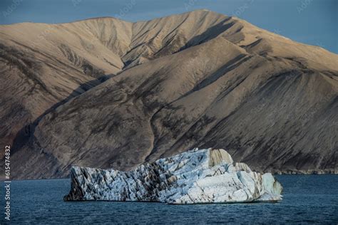 Silt Streaked Iceberg Floating In Greenlands Kaiser Franz Joseph Fjord