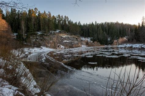 River Of Gauja In Latvia In Winter With Floating Ice Blocks Stock Photo