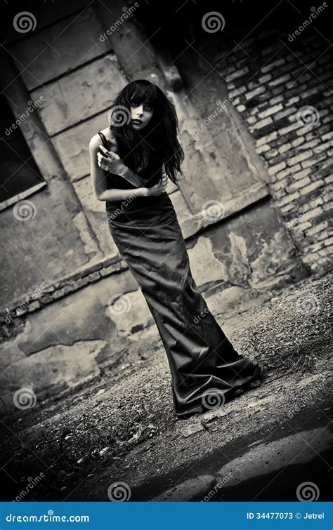 Gloomy Portrait Of Strange Depressive Goth Girl Among The Ruins Low