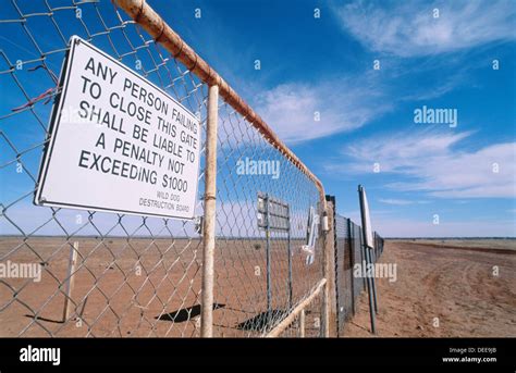 Gate along dingo fence, which is 5614 km in length, longest fence in Stock Photo: 60551187 - Alamy