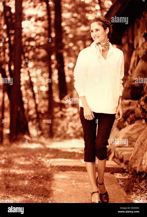 Woman Walking Outdoors Sepia Toned People Women Activities Outdoors