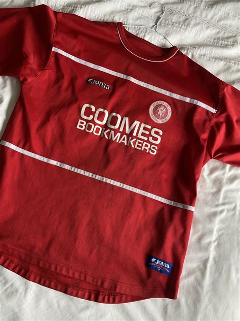 Welling United Home football shirt 2004 - 2005. Sponsored by Coomes Bookmakers