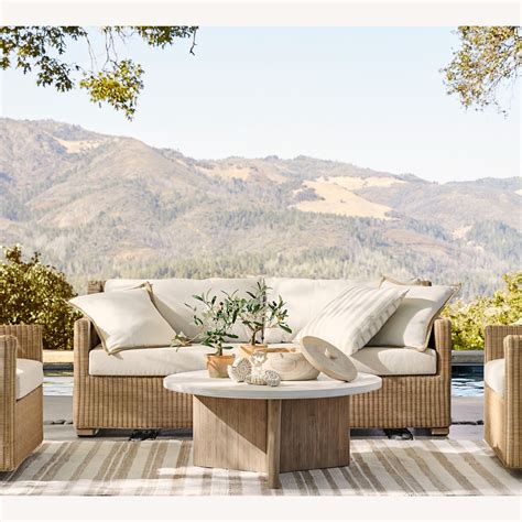 Pottery Barn Hampton Wicker Outdoor Sofa - AptDeco