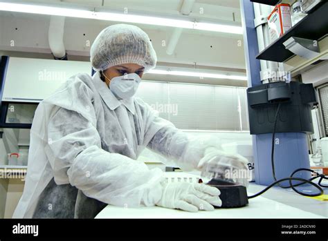 DNA test in anthropology laboratory. Researcher carrying out a DNA ...