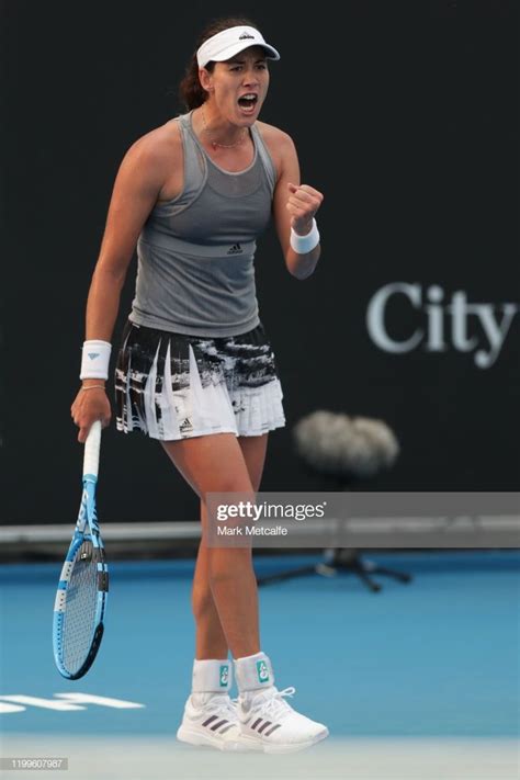 Garbine Murguruza Of Spain Celebrates Winning A Point During Her