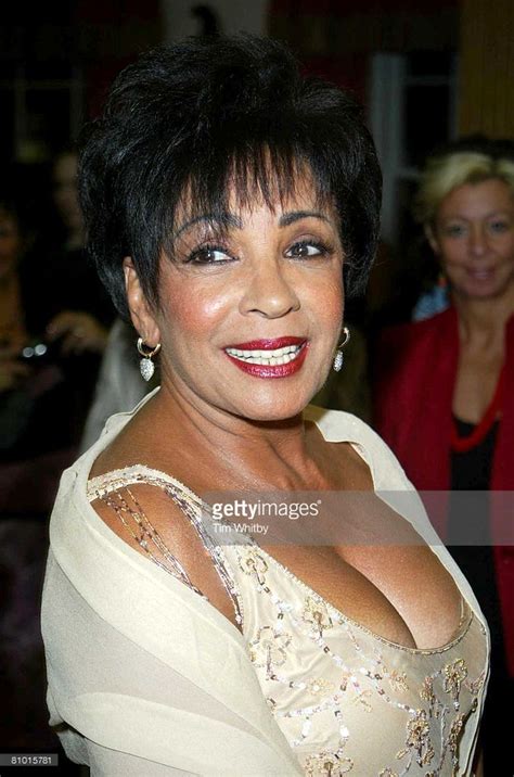 Dame Shirley Bassey Arrives At A Gala Charity Auction Of Glittering Gowns From The Collection Of