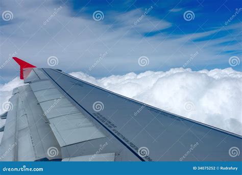 Airplane Flying Above the Clouds Stock Photo - Image of destinations ...