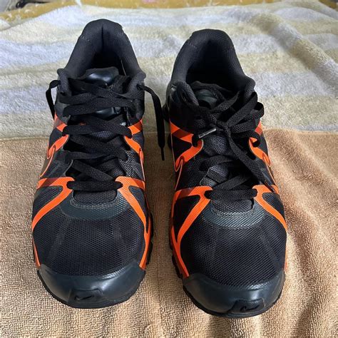 Orange and Black Nike Shoes Size 11.5 Slightly used - Depop