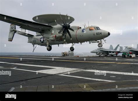 A E 2D Hawkeye Early Warning And Detection Aircraft Lands On The Deck