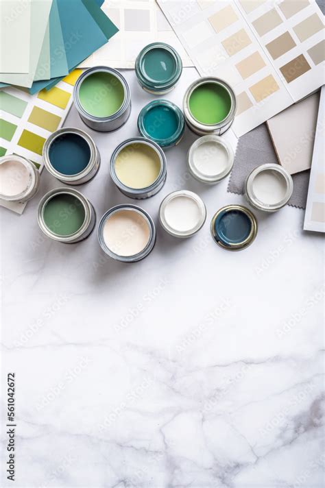 Tiny sample paint cans during house renovation, process of choosing ...