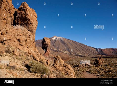 Rock Formation Roques De Garcia And Mount Pico Del Teide Teide