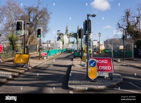 A still closed Hammersmith Bridge and road closure signage in southwest ...