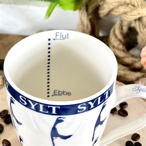 Kaffeebecher Sylt 350ml Mit Insel Sylt Und Ebbe Und Flut Anzeige