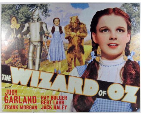 1660 - METAL ADVERTISING SIGN - WIZARD OF OZ YELLOW BRICK ROAD - 12.5X16"