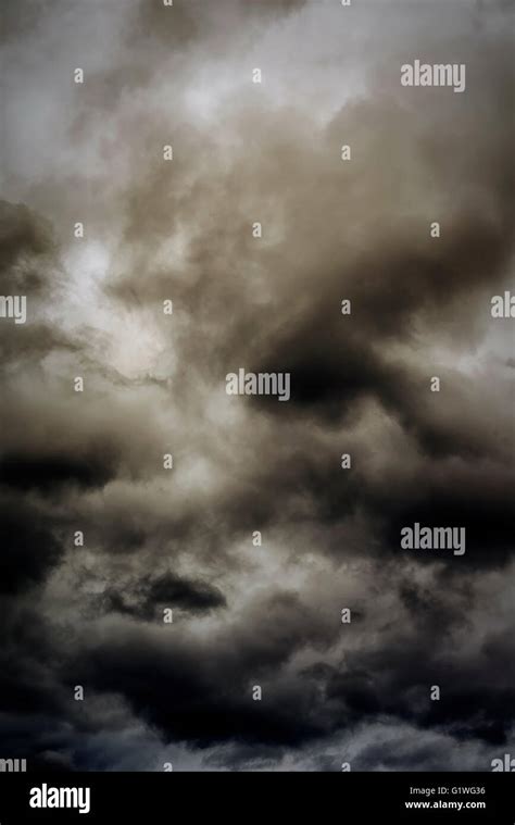 Dark ominous clouds create a dramatic sky background Stock Photo - Alamy