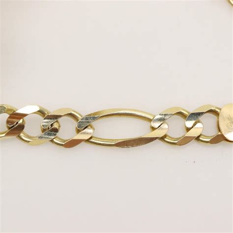 Kt Two Toned Gold Name Plate Figaro Link Bracelet Property Room