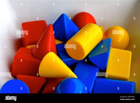 Close up aerial view of plastic 3d shapes in red, yellow and blue Stock ...