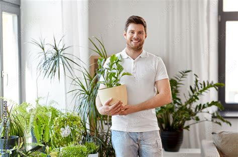 Person Holding Plant