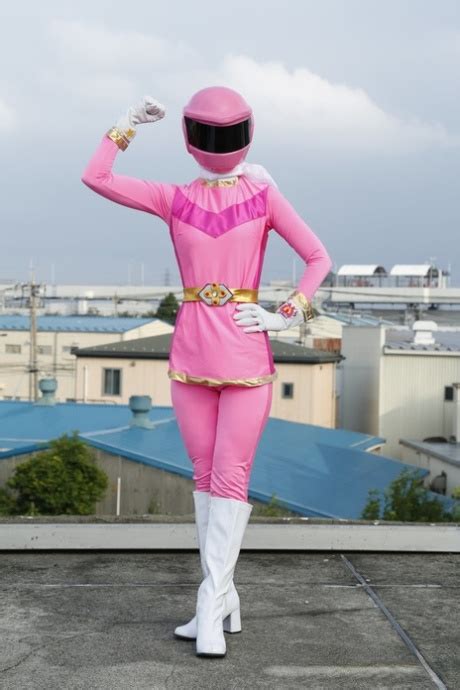 Solo Model Sentai Brave Poses In Futuristic Clothing On A Rooftop