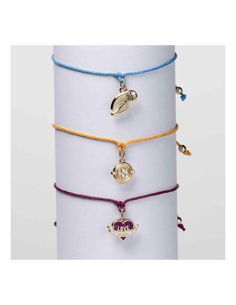 Set Pulseras Harry Potter Giratiempos Snitch Dorada Y Love Potion