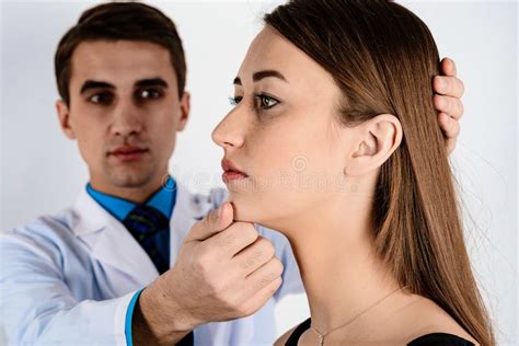 Face Skin Check Before Plastic Surgery Beautician Touching Woman Face