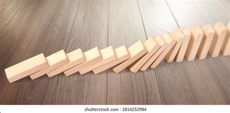 Domino Effect Stopped By Unique One Stock Photo Shutterstock