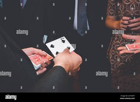 Magician card tricks Stock Photo - Alamy