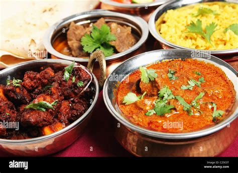 Chicken Fry Left And Kashmiri Lamb Curry Right In Front Of