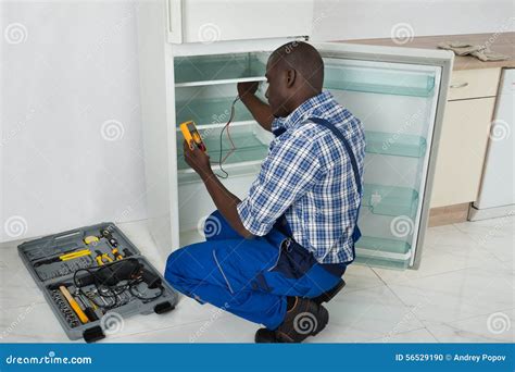 Technician Repairing Refrigerator Appliance Stock Photo Image Of