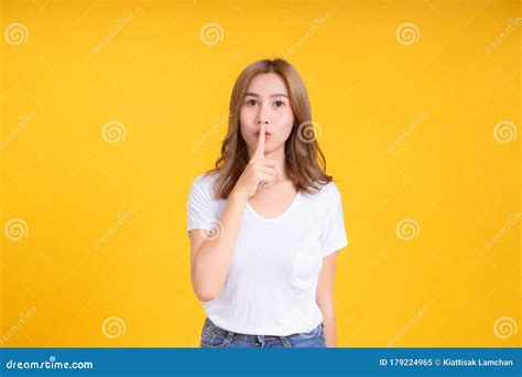 Portrait Young Asian Woman Finger On Lips Shhhhh Quiet Symbol Gesture