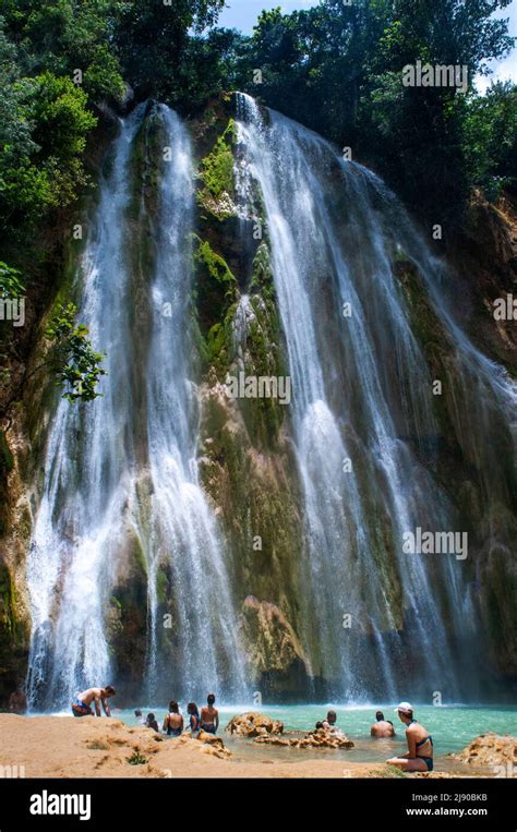 Tourists In The Scenic Cascade Of El Limon Waterfall In Jungles Of