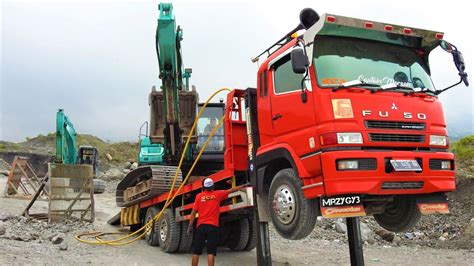 Excavator Trucking With Fuso Super Great Self Loader Truck Kobelco