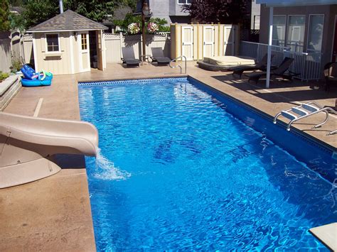 Fiberglass Pool With Slide And Hot Tub Tub Pools Swimming Pools Fiberglass Pools Dream Pools