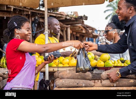 People Buying And Selling In A Local African Market Stock Photo Alamy