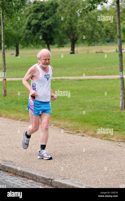 Old Man Senior Citizen Pensioner Runner Running Keeping Fit In Stock