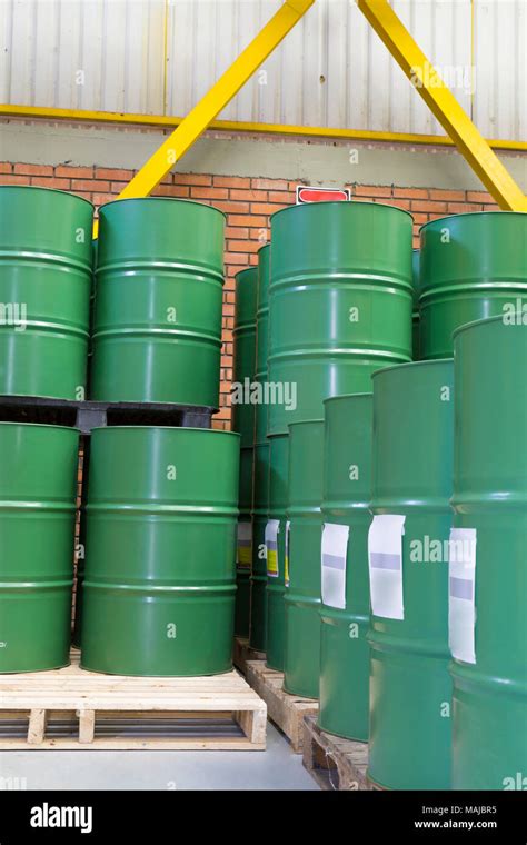 Green Barrels Or Chemical Drums Stacked Up Stock Photo Alamy