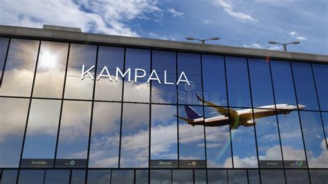 Airplane Landing at Kampala Uganda Airport Mirrored in Terminal Stock ...